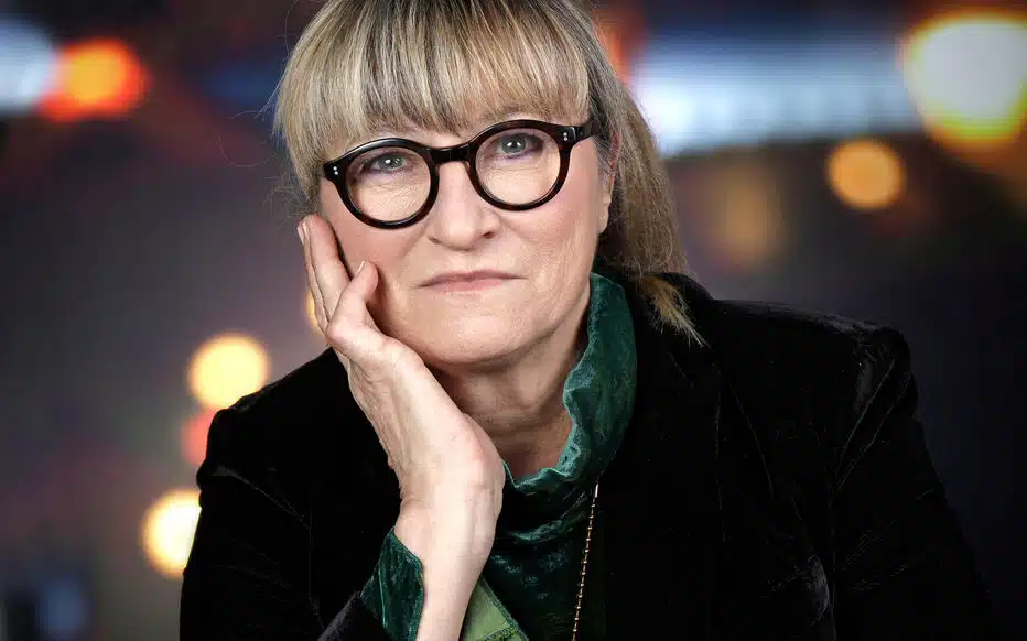 Christine Bravo souriante, évoquant son parcours