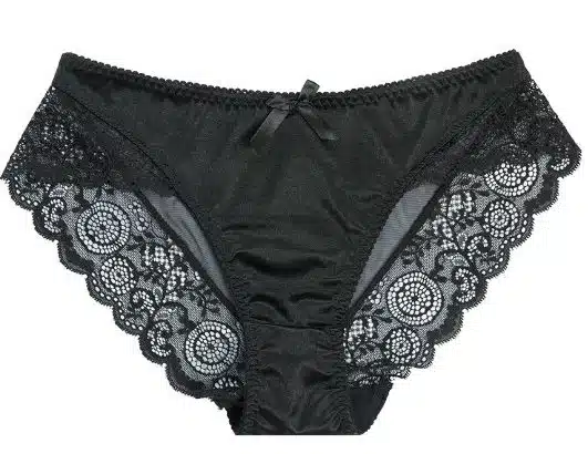 Lingerie noire élégante sur fond neutre