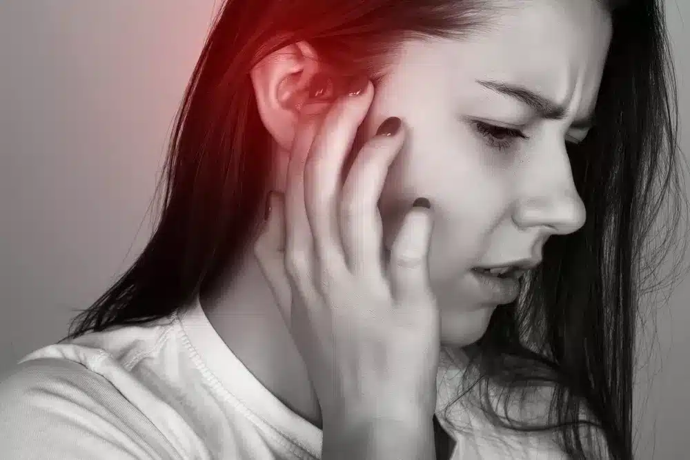 Illustration d'une oreille avec sensation de sifflement