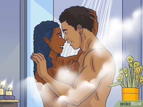 Couple sous la douche ajustant la température de l'eau